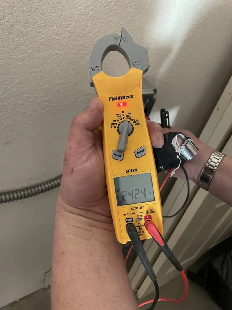 Voltage testing with clamp meter during Circuit Breaker Repair in Pell City